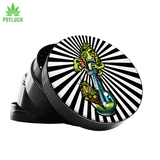 Standard black metal grinder with black and white stripes and a nug smoking a nug from a bong